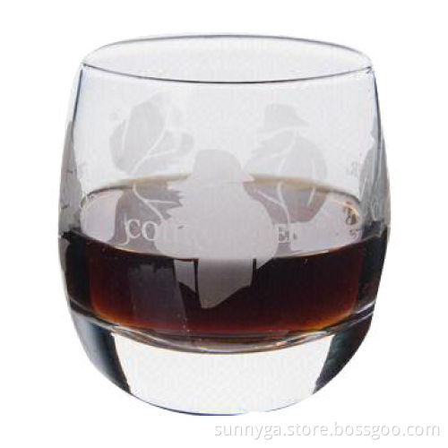 Mouth blown made whisky glass with etched logo